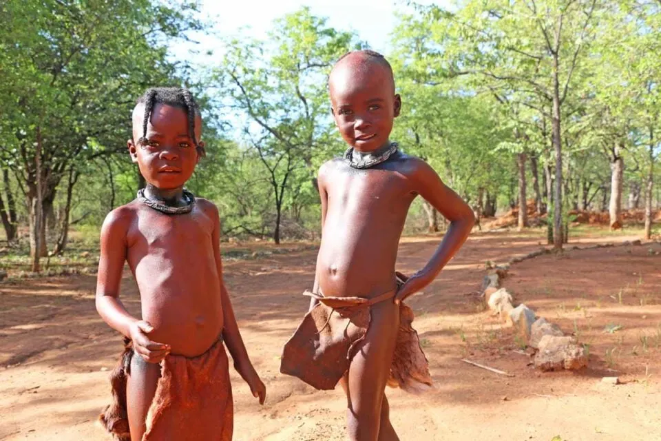 source: stingynomads.com Two young Himba boys at the Ovahimba Living Museum in Namibia