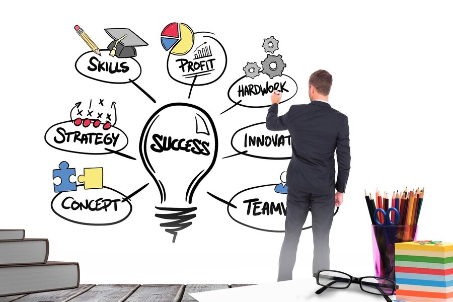 Composite image of business man writing with chalk